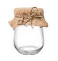 Empty glass jar with sacking and rope