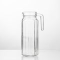 Empty glass jug, white background Royalty Free Stock Photo