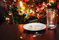 empty glass from milk and crumbs from cookies for Santa Claus un Royalty Free Stock Photo