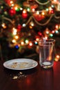 empty glass from milk and crumbs from cookies for Santa Claus un Royalty Free Stock Photo