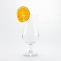 Empty glass with orange slice Royalty Free Stock Photo