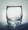 Empty glass with reflection on white background Royalty Free Stock Photo