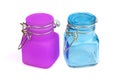 Empty glass spice jar. Purple and blue jar for spice isolated. Cooking utensil. Kitchen ware. Kitchen utensils Royalty Free Stock Photo