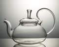 Empty glass teapot on a gray background Royalty Free Stock Photo