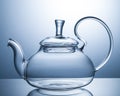 Empty glass teapot on a gray background Royalty Free Stock Photo