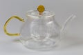 Empty glass teapot on a gray background Royalty Free Stock Photo