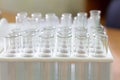 Empty glass test tubes in white plastic rack Royalty Free Stock Photo