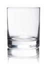 Empty glass for whiskey on white background