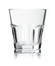 Empty glass for whiskey on white background