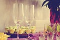 Empty glass wine glasses for drinks stand on the table. Tinting in the style of instagram Royalty Free Stock Photo