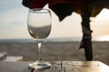 empty glass for wine almost a wooden table Royalty Free Stock Photo