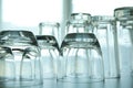 Empty glasses on grey table against blurred background Royalty Free Stock Photo