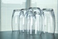 Empty glasses on grey table against blurred background Royalty Free Stock Photo