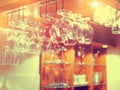 Empty glasses hanging above the bar in the restaurant Royalty Free Stock Photo