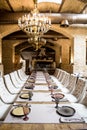 Empty glasses set in restaurant. Banquet table set. Interior of a luxury restaurant Royalty Free Stock Photo