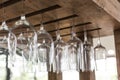 Empty glasses for wine above a bar rack Royalty Free Stock Photo