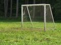 Empty goal in the meadow sunny day