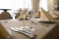 Empty goblets and other cutlery are served on the festive table Royalty Free Stock Photo