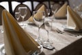 Empty goblets and other cutlery are served on the festive table Royalty Free Stock Photo