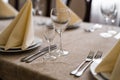 Empty goblets and other cutlery are served on the festive table Royalty Free Stock Photo