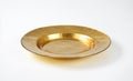 Empty gold plate Royalty Free Stock Photo