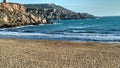 Empty Golden bay beach with cliffs Royalty Free Stock Photo