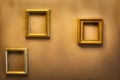 Empty golden luxury frames on vintage design wall, space for text. antique luxe interior