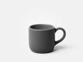 Empty Gray Ceramic Mug on White Surface, Studio Shot Royalty Free Stock Photo
