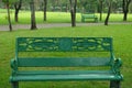 Empty green chair in the public park Royalty Free Stock Photo