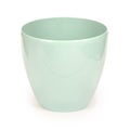 Empty green flower pot isolated on white. Pastel shades. High resolution photo. Full depth of field, side view