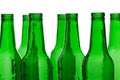 Empty green glass bottles isolated on white background. Concept for recycling Royalty Free Stock Photo