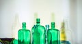 Empty green glass bottles stand in row Drink Concept Royalty Free Stock Photo