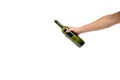 Empty, green, glass wine bottle in hand on a white background, isolate Royalty Free Stock Photo