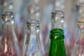Empty green and white glass bottles. Royalty Free Stock Photo