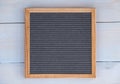 empty grey felt letterboard on natural wood background Royalty Free Stock Photo