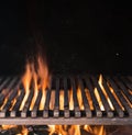 Empty grill grate and tongues of fire flame. Barbeque night background Royalty Free Stock Photo