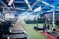 Empty gym, equipment and studio for fitness, exercise and sports or wellness training indoors. Treadmill, machines and Royalty Free Stock Photo
