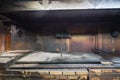 Empty pit room of old Texas BBQ Meat Market in West Texas, Ameri Royalty Free Stock Photo