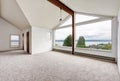 Empty hallway interior with carpet floor, big window and perfect water view Royalty Free Stock Photo