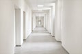 empty hallway, very long corridor with many doors for rooms of hospital, hotel, school or laboratory, building with many office, Royalty Free Stock Photo