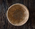 Empty handmade basket on wood