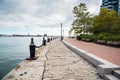 Empty harbourside path on a cloudy autumn day