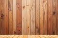 Empty hardwood table on raintree wooden wall background Royalty Free Stock Photo