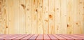 Empty hardwood table top in front of raintree wooden wall Royalty Free Stock Photo