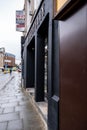 Empty High Street With An Estate Agents To Let Sign for Commercial Offices Royalty Free Stock Photo