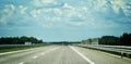 Empty highway asphalt road and beautiful sky Royalty Free Stock Photo