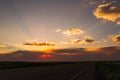 Empty highway asphalt road and beautiful sky sunset landscape. Landscape scene and sunrise above road. Royalty Free Stock Photo