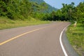 Empty highway in green summer landscape. Straight road in wild forest. Summer outdoor travel landscape. Royalty Free Stock Photo
