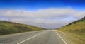 Highway landscape with moving cars at daytime Royalty Free Stock Photo