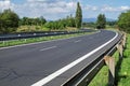 Empty highway passing landscape trees Royalty Free Stock Photo